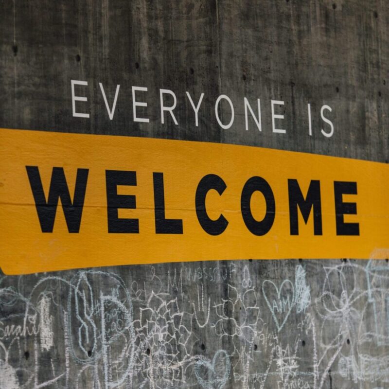 Everyone Is Welcome written on chalkboard inviting people to The Inclusive Christian